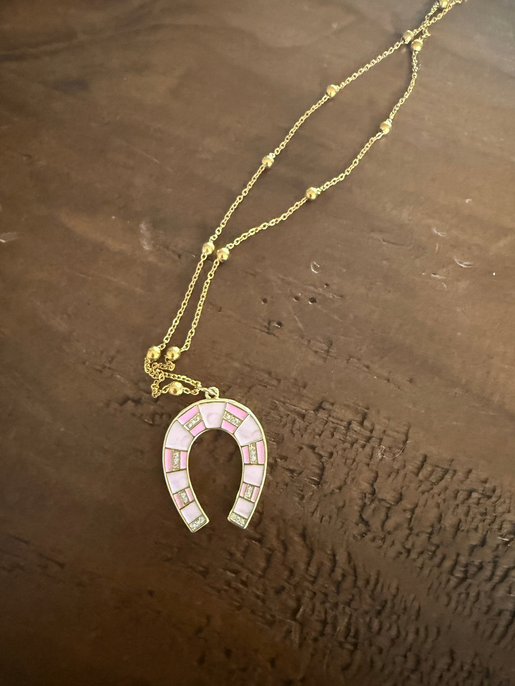 large horseshoe pendants