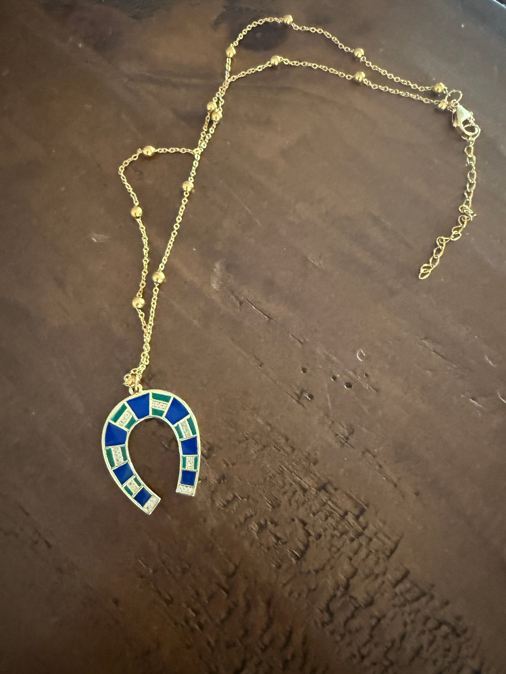 large horseshoe pendants
